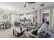 Open living room featuring a comfortable sectional sofa and coffee table at 2451 Datura Loop, St Cloud, FL 34772