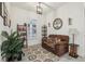 Home office with a couch and decorative wall art at 2451 Datura Loop, St Cloud, FL 34772