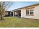 Backyard view of the screened porch at 2451 Datura Loop, St Cloud, FL 34772