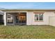 Backyard view of the screened porch at 2451 Datura Loop, St Cloud, FL 34772
