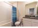 Clean bathroom with a shower/tub combo and granite countertop at 2778 Sunkissed Dr, St Cloud, FL 34771