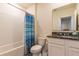 Clean bathroom with a shower/tub combo and granite countertop at 2778 Sunkissed Dr, St Cloud, FL 34771