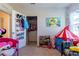 bedroom with playful decor and ample closet space at 2778 Sunkissed Dr, St Cloud, FL 34771