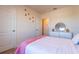 Bright bedroom with a comfortable bed and plenty of natural light at 2778 Sunkissed Dr, St Cloud, FL 34771