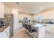 Modern kitchen with granite countertops and stainless steel appliances at 2778 Sunkissed Dr, St Cloud, FL 34771