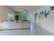 Spacious living area with sectional sofa and art at 2778 Sunkissed Dr, St Cloud, FL 34771