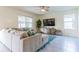Living room with sectional sofa and large TV at 2778 Sunkissed Dr, St Cloud, FL 34771