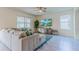Living room with sectional sofa and large TV at 2778 Sunkissed Dr, St Cloud, FL 34771