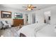 Bright main bedroom featuring a dresser and neutral color palette at 2818 Roccella Ct, Kissimmee, FL 34747