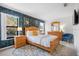 Charming bedroom boasting an accent wall, stylish decor, and ample natural light at 2818 Roccella Ct, Kissimmee, FL 34747