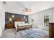 Stylish bedroom showcasing a decorative accent wall and plush bedding at 2818 Roccella Ct, Kissimmee, FL 34747