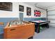 Spacious game room featuring foosball and air hockey for fun and entertainment at 2818 Roccella Ct, Kissimmee, FL 34747
