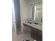 Bathroom with a double sink and vanity at 2889 Paige Dr, Kissimmee, FL 34741
