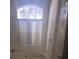 Bathroom with a bathtub and large window at 2889 Paige Dr, Kissimmee, FL 34741