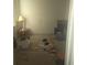 Small bedroom with carpeted floor, window, and simple nightstand at 2889 Paige Dr, Kissimmee, FL 34741