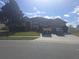Two-story house with a two-car garage and well-maintained lawn at 2889 Paige Dr, Kissimmee, FL 34741