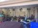 Two-car garage with various items stored inside at 2889 Paige Dr, Kissimmee, FL 34741