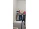 Laundry room with washer, dryer, and shelving at 2889 Paige Dr, Kissimmee, FL 34741