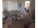 Living room featuring plush sofas and a coffee table at 2889 Paige Dr, Kissimmee, FL 34741