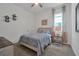 Bedroom with ceiling fan, carpeted floors, and a neutral color palette at 3055 Prospect Trl, St Cloud, FL 34771