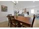 Open concept dining room with a view of the kitchen at 3055 Prospect Trl, St Cloud, FL 34771