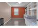 Bright bedroom with built-in shelving and window at 476 Haines Trl, Winter Haven, FL 33881