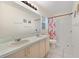 Bathroom boasts double sinks, shower, and tile flooring at 511 Cardinal Dr, Kissimmee, FL 34759