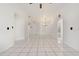 Spacious living room featuring tile flooring and ceiling fan at 511 Cardinal Dr, Kissimmee, FL 34759