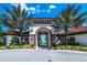Archway entrance to resort-style community pool area at 7638 Oakmoss Loop, Davenport, FL 33837