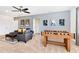 Game room with sofa, coffee table, and foosball at 7638 Oakmoss Loop, Davenport, FL 33837