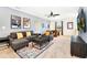 Fun game room with a sectional sofa, foosball table, and movie posters at 7638 Oakmoss Loop, Davenport, FL 33837