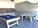 Fun game room with pool table and air hockey at 7638 Oakmoss Loop, Davenport, FL 33837