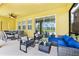 Outdoor patio furniture with seating and dining area at 7638 Oakmoss Loop, Davenport, FL 33837