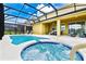 Inviting pool and spa with screened lanai at 7638 Oakmoss Loop, Davenport, FL 33837