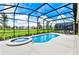 Screened pool and spa with plenty of space at 7638 Oakmoss Loop, Davenport, FL 33837