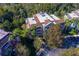 Aerial view of building showcasing its architecture and surrounding landscape at 7658 Whisper Way # 202, Reunion, FL 34747