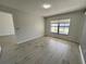 Spacious bedroom with large window and tile flooring at 812 Park Villa Cir, Orlando, FL 32824