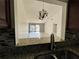 View of living room with vaulted ceiling, chandelier, and sliding glass doors at 812 Park Villa Cir, Orlando, FL 32824