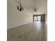 Bright living room with tile flooring and access to a patio at 812 Park Villa Cir, Orlando, FL 32824