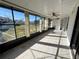 Sunroom with multiple windows and backyard access at 812 Park Villa Cir, Orlando, FL 32824