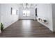 Spacious dining room with wood flooring and large window at 9067 Arbors Edge Trl, Windermere, FL 34786