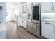 Modern kitchen with stainless steel appliances and white cabinetry at 9067 Arbors Edge Trl, Windermere, FL 34786