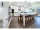 Spacious kitchen featuring a large island and breakfast bar at 9067 Arbors Edge Trl, Windermere, FL 34786