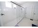 Large walk-in shower with glass enclosure and tile flooring at 9067 Arbors Edge Trl, Windermere, FL 34786