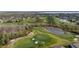 Aerial view of golf course with water features at 9434 Myrtle Creek Ln # 914, Orlando, FL 32832