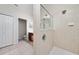 Walk-in shower with tiled walls and floor at 9434 Myrtle Creek Ln # 914, Orlando, FL 32832