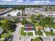 An aerial view shows the property in relation to the neighborhood, roadways, and commercial areas at 1022 Mack Ave, Orlando, FL 32805