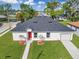 Beautiful single Gathering home featuring a new roof, a well manicured lawn, and an attached garage at 1022 Mack Ave, Orlando, FL 32805