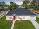 Beautiful single Gathering home featuring a new roof, a well manicured lawn, and an attached garage at 1022 Mack Ave, Orlando, FL 32805