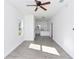 View of living room looking into kitchen; home offers an open concept design at 1022 Mack Ave, Orlando, FL 32805